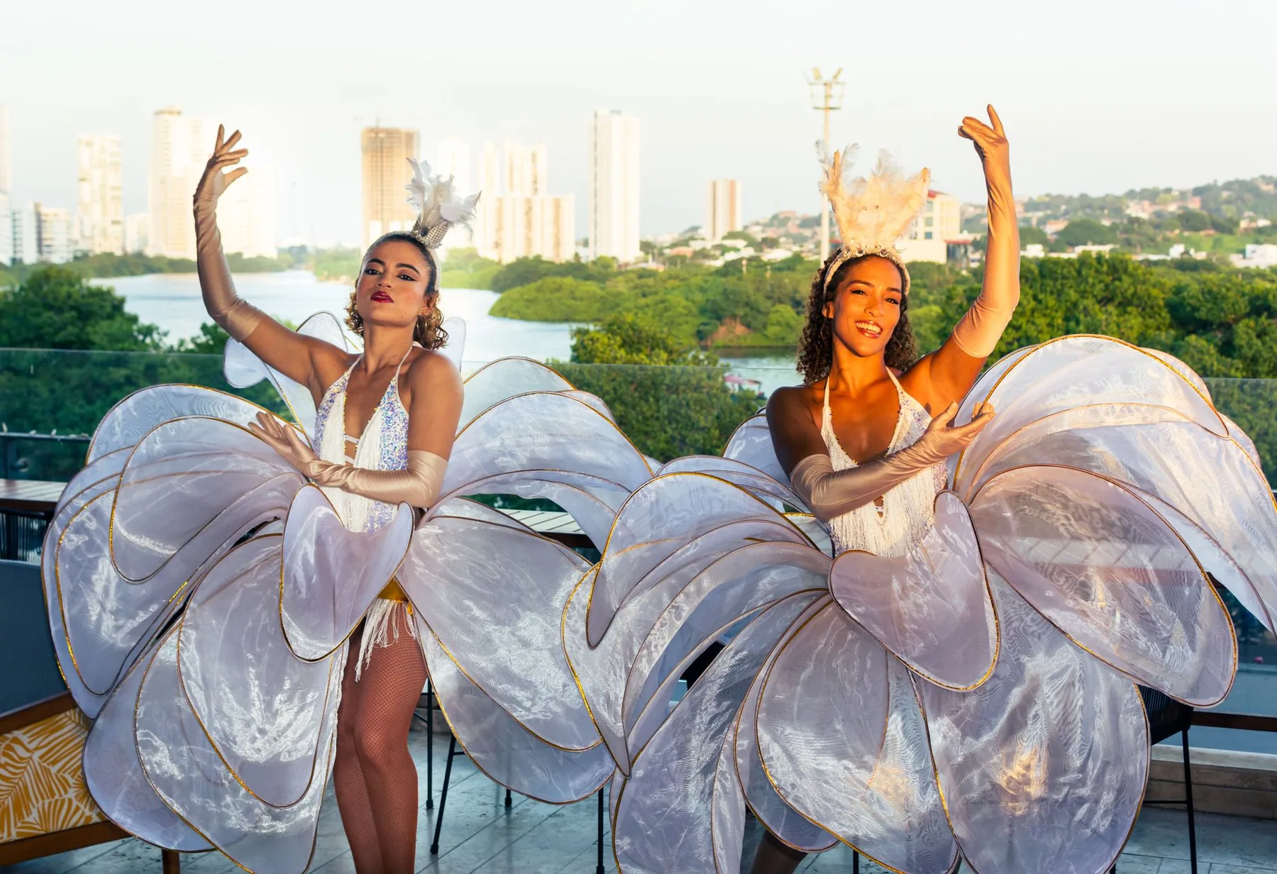 Salsa dancers in white costumes