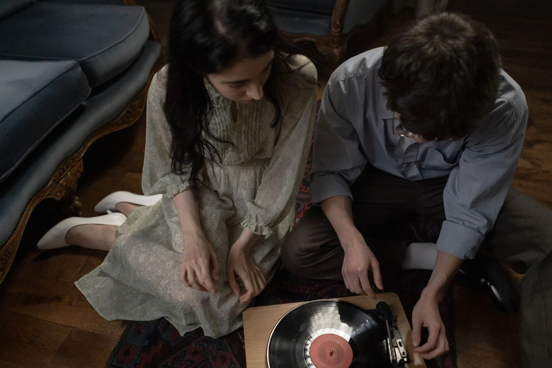 Couple listening to a music record