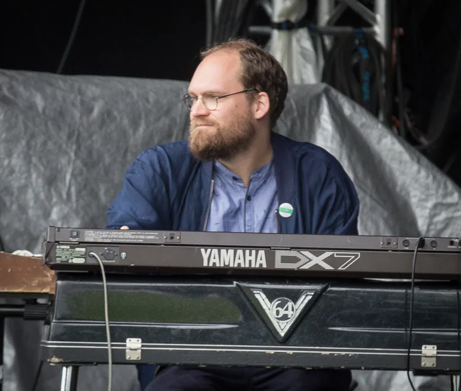 Musician playing an electronic keyboard Musician playing an electronic keyboard