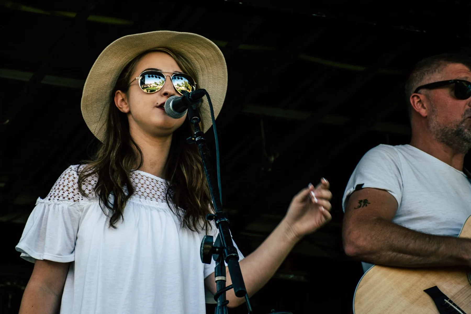 Singer on stage with a guitarist