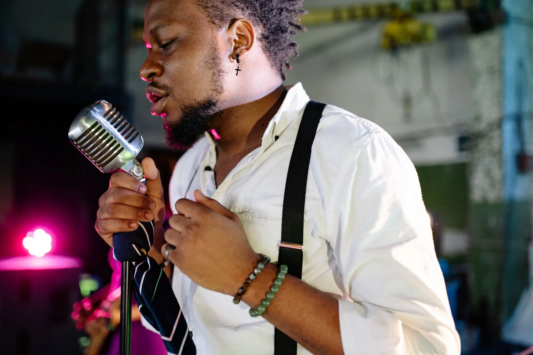 Singer performing with a vintage microphone