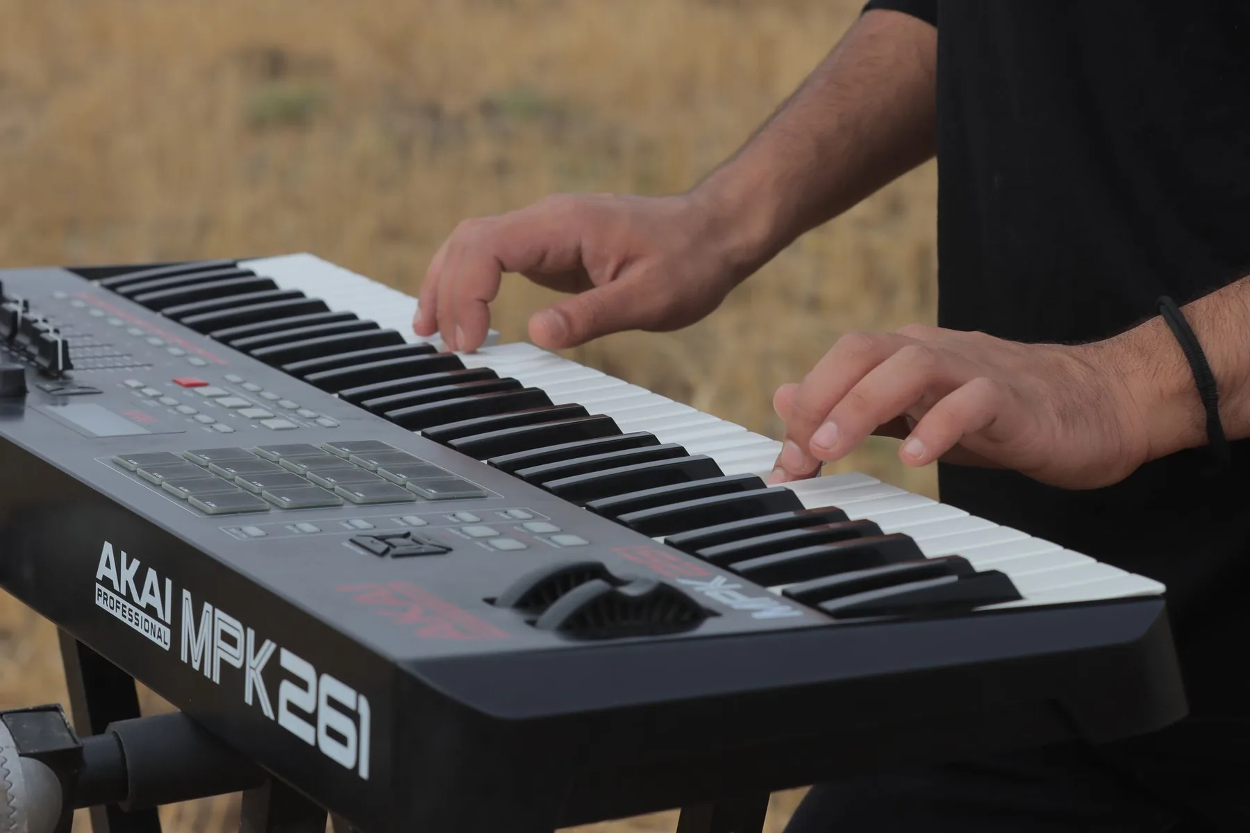 Musician playing an electronic keyboard